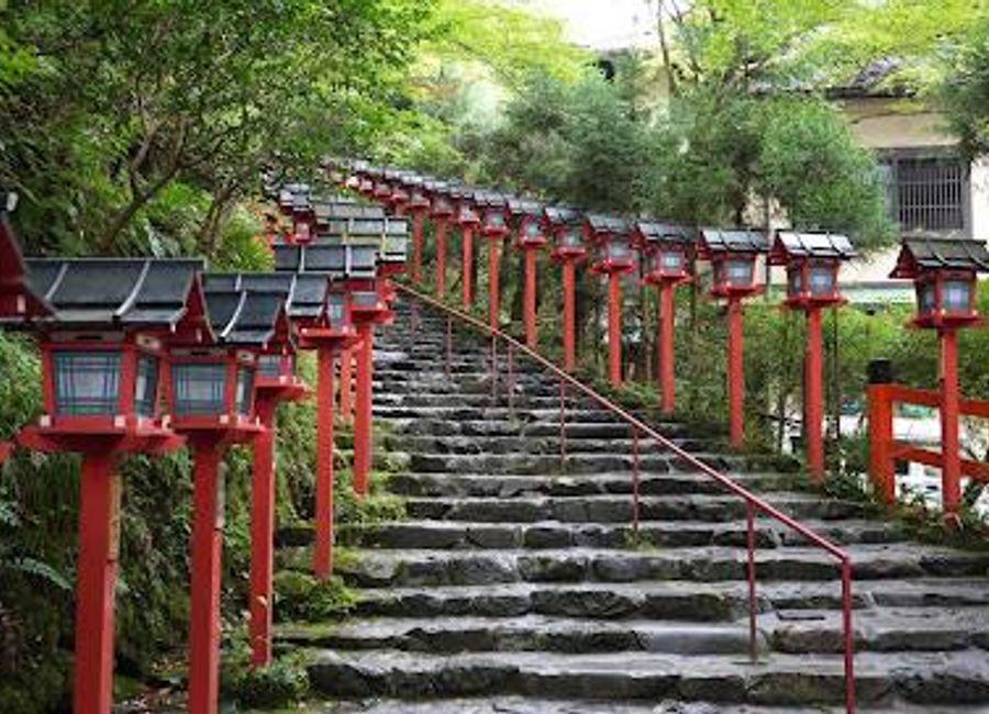 Discover the serene beauty of Kifune Shrine, a hidden gem in Kyoto where spirituality meets nature amidst lush landscapes.