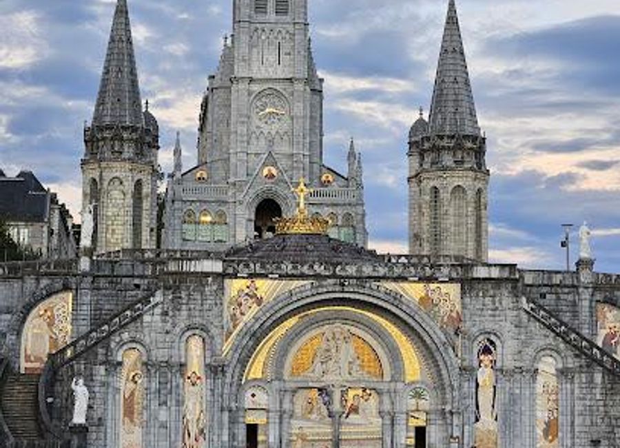 Discover the architectural splendor and spiritual heart of Lourdes at the Basilica of Our Lady of the Rosary, a renowned Catholic pilgrimage site.
