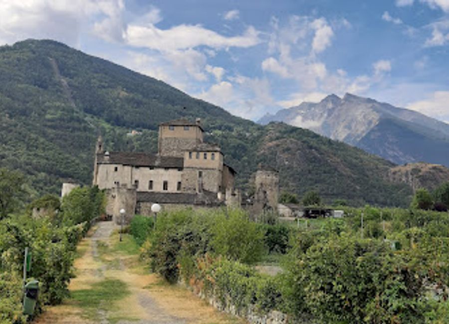 Explore the captivating Castello Sarriod de La Tour, a medieval castle in Aosta Valley, showcasing stunning architecture and breathtaking mountain views.