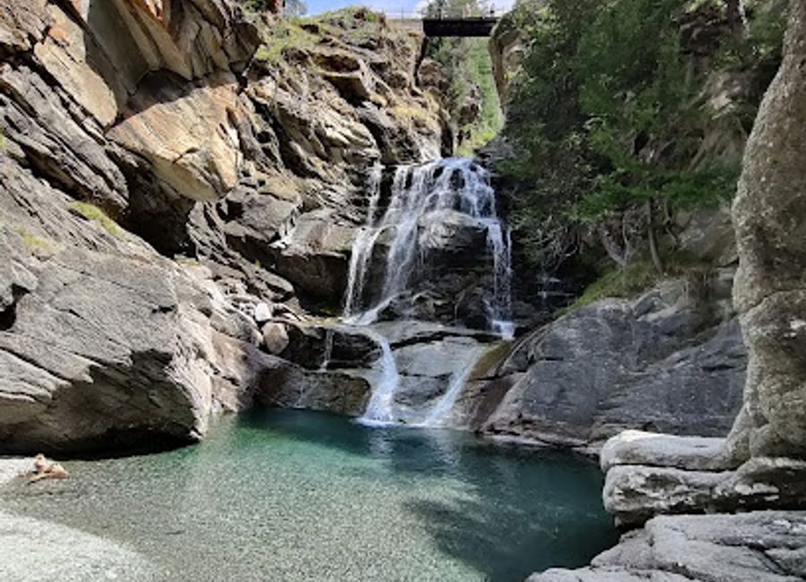 Explore the breathtaking Cascate di Lillaz in Aosta Valley, a stunning natural wonder perfect for hiking and enjoying serene alpine beauty.