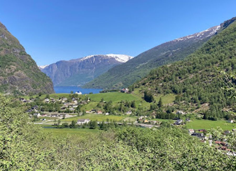 Discover the breathtaking Brekkefossen waterfall in Flåm, Norway, surrounded by stunning landscapes and majestic fjords.