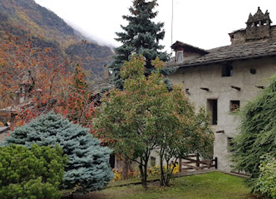 Explore the historical Maison de Mosse, a captivating fortress in Aosta Valley, surrounded by breathtaking landscapes and rich Italian heritage.