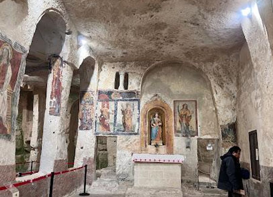Explore Matera's Chiesa di Santa Lucia alle Malve, a rock-hewn church with ancient frescoes and a rich Benedictine history.