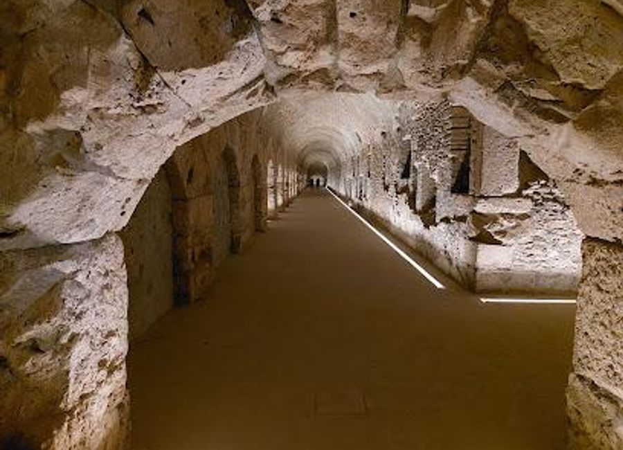 Discover the enchanting Criptoportico Forense, a historical landmark in Aosta, Italy that showcases the grandeur of Roman architecture amidst stunning alpine scenery.
