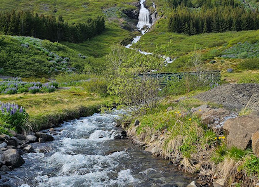 Explore the breathtaking beauty of Tungudalur Vestfjarðagöng, a stunning tourist attraction in Ísafjörður, Iceland, ideal for nature lovers and adventurers.