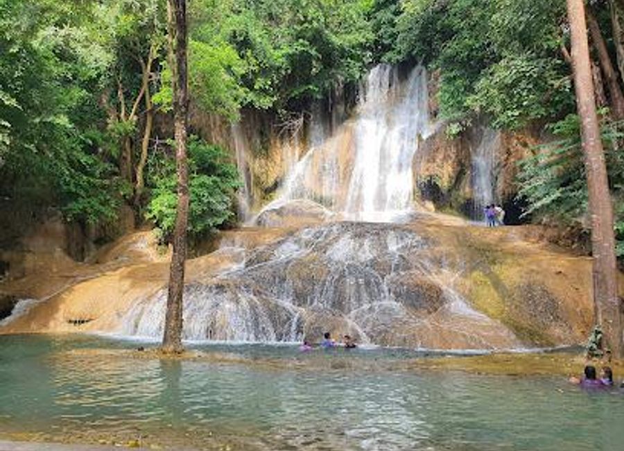 Experience the natural beauty of Sai Yok Noi Waterfall in Kanchanaburi, a serene and picturesque attraction perfect for relaxation and adventure.