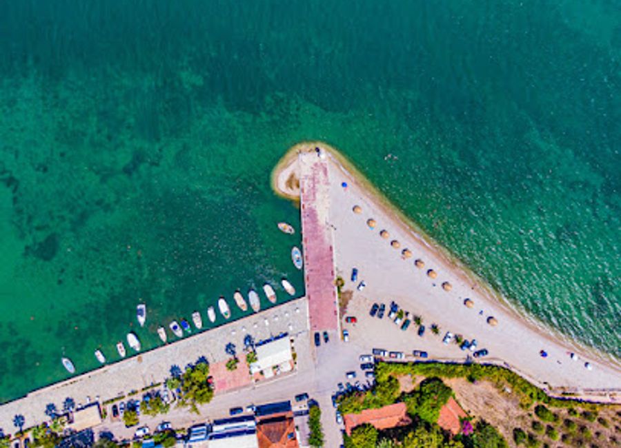 Discover the enchanting Myli Beach in Greece, where golden sands meet crystal-clear waters for the ultimate Mediterranean escape.