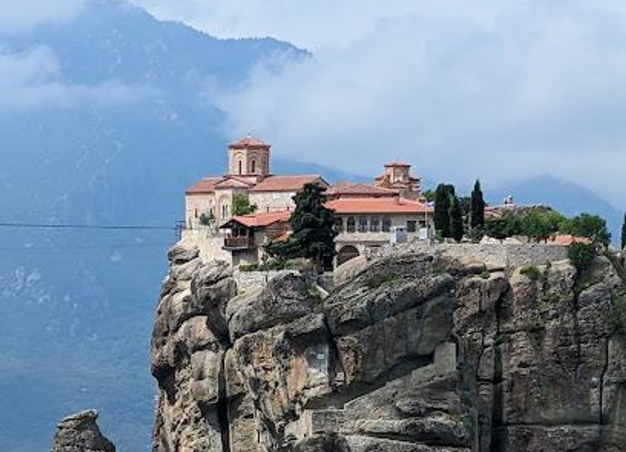 Explore the Monastery of the Holy Trinity at Meteora, a stunning blend of spirituality, history, and breathtaking views in Greece's iconic landscape.