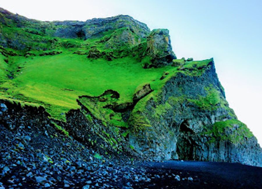 Explore the majestic Reynisdrangar Cliffs, where folklore meets breathtaking natural beauty on Iceland's southern coast.