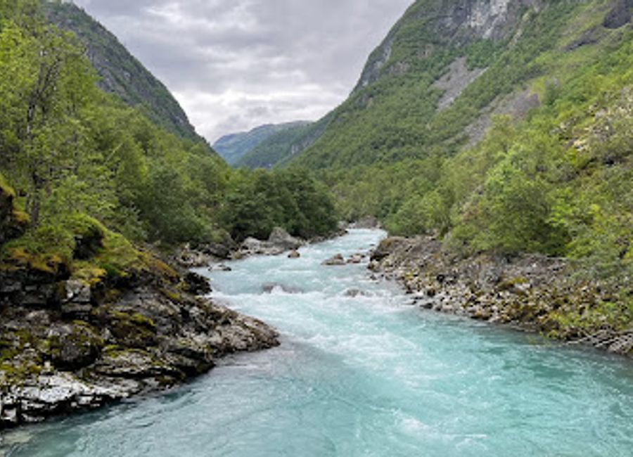 Discover the breathtaking Vettisfossen, one of Norway's tallest and most beautiful waterfalls, surrounded by stunning landscapes and hiking trails.