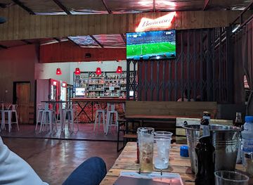 zambia/liuwa-plain/bar/wooden-cabin-pub-grill