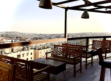 jordan/wadi-araba/bar/dusk-rooftop-and-bar