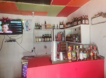 ghana/western-north-region/bar/chicken-wings-sausage-gizzards-bar-oli-s-pub-bibiani