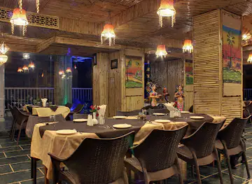 The Sitting Elephant - A Rooftop Restaurant Overlooking River Ganga