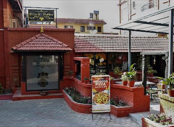 nepal/patan/hiranya-varna-mahavihar-golden-temple/bar/black-pepper-cafe-pub