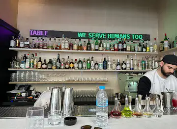 THE BAR IN FRONT OF THE BAR