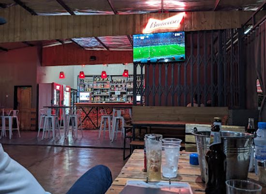 zambia/liuwa-plain/bar/wooden-cabin-pub-grill