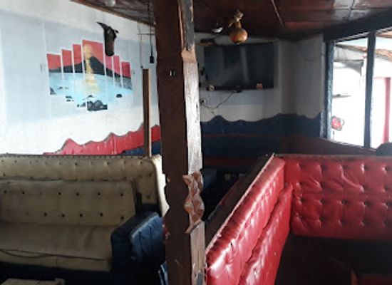 guinea/conakry/bar/frock-man