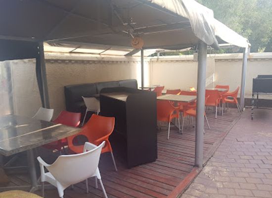 south-africa/pretoria/hatfield/bar/round-table-exquisite-lounge