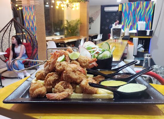 ecuador/santo-domingo-de-los-tsachilas-region/bar/zuba-alitas-cortes-mariscos