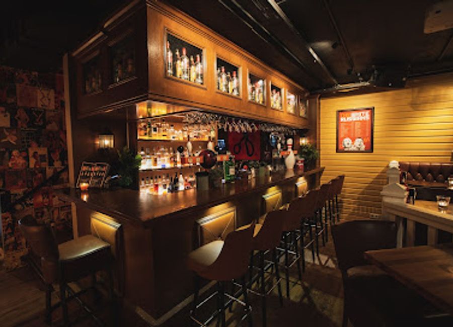 Experience the charm of 'The Big Lebowski' at the Lebowski Bar in Reykjavík, where themed drinks and quirky decor come together for a unique nightlife experience.