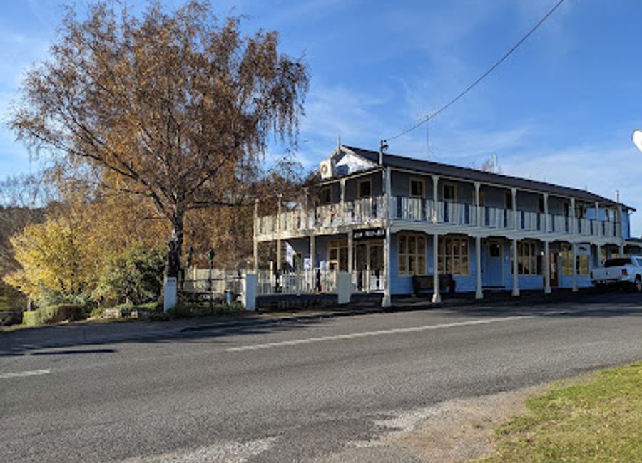 Experience Tasmania's culinary delights at Wandering Trout, where gourmet dining meets cozy lodge accommodations amidst stunning mountain views.