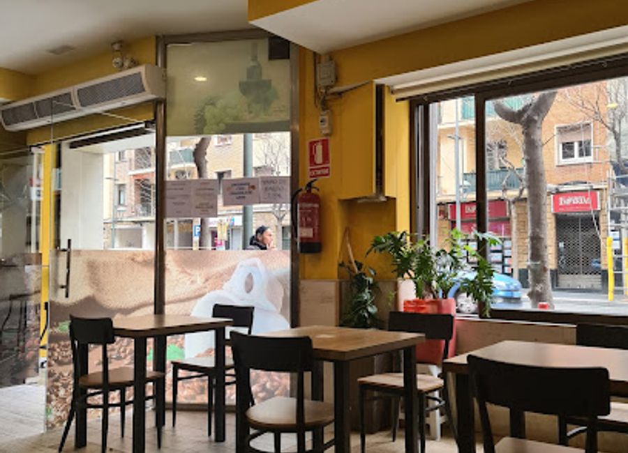 Experience the vibrant flavors of Tarragona at Bar Dorado, a cozy bar offering delicious tapas and a welcoming atmosphere.