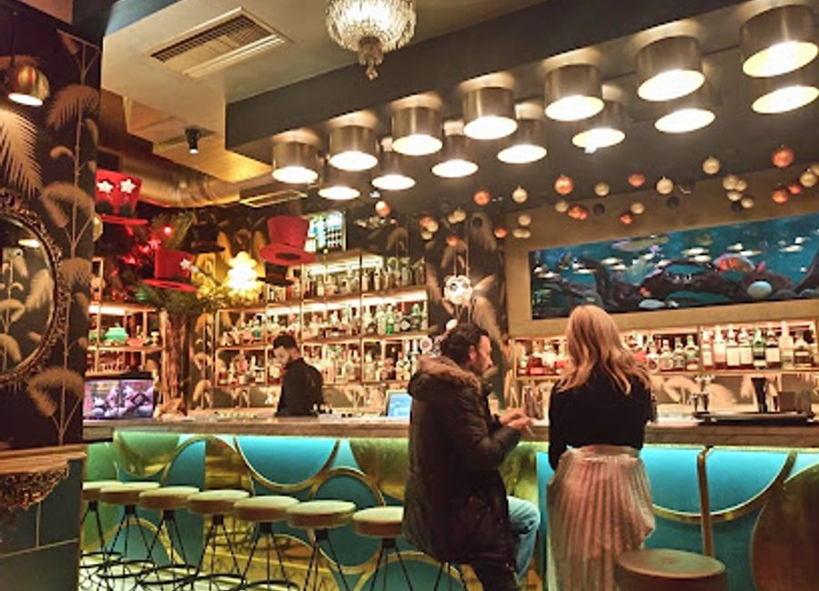Discover Drunk Sinatra, a vibrant bar in Athens offering unique cocktails, lively music, and an unforgettable nightlife experience.