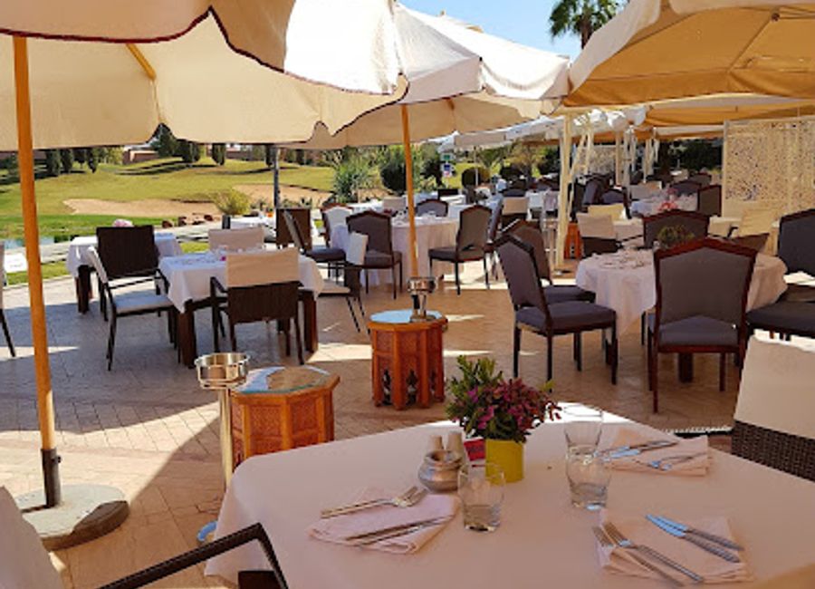 Experience the best of Moroccan cuisine and stunning views at La Terrasse, Atlas Golf Marrakech, a perfect retreat for travelers.