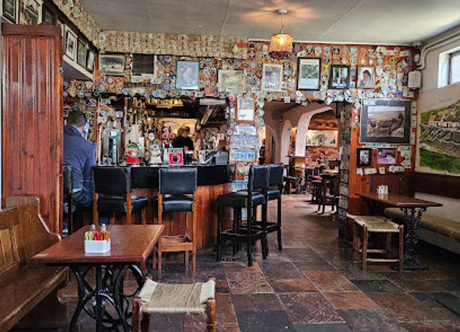 Experience the essence of Irish culture at Gus O'Connor's Pub in Doolin, where hearty food meets lively traditional music in a welcoming atmosphere.