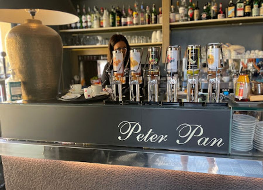 Experience the best of Parma at Peter Pan Wine Bar, where quality coffee meets exquisite wines in a cozy atmosphere.