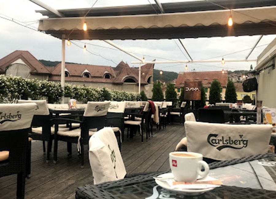Experience the charm of Sighișoara at Vintage Lounge—your cozy retreat for drinks, dining, and relaxation in the heart of this medieval town.