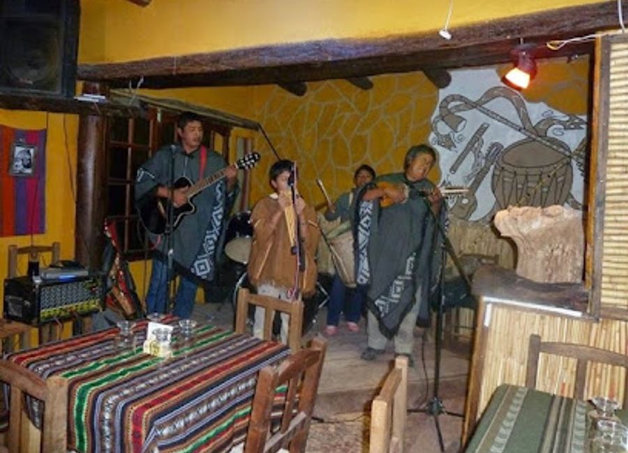 Experience the flavors of Jujuy at Peña de Chuspita, where every meal is accompanied by enchanting live piano music.