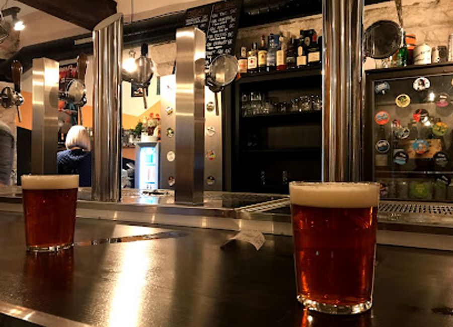 Experience Trento's vibrant nightlife at L’Angolo dei 33, a cozy pub offering local brews and a warm atmosphere in the heart of the city.