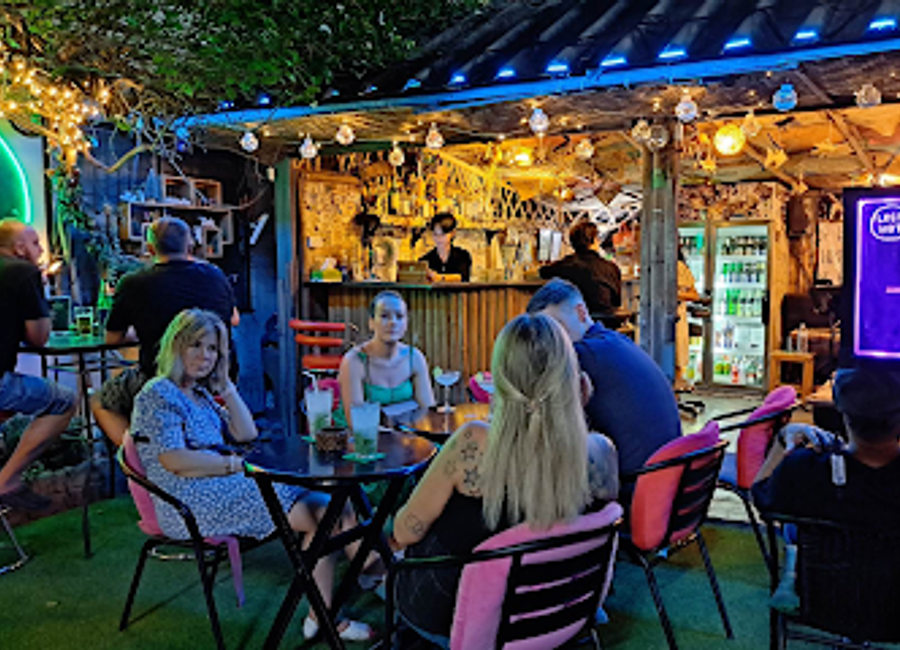 Experience the vibrant nightlife of Chiang Mai at Lost Hut, a cozy bar offering a unique blend of local culture and refreshing drinks.