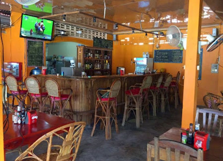 Experience the vibrant atmosphere and delicious offerings at Rusty Keyhole Two, Krong Kampot's premier sports bar for tourists and locals alike.