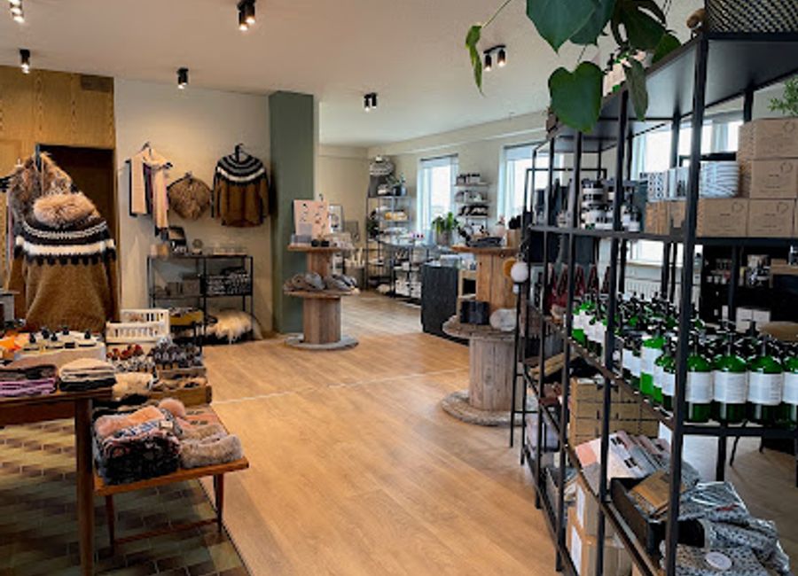 Explore Útgerðin in Hellissandur: A unique fusion of art, coffee, and wine in a cozy, creative atmosphere.