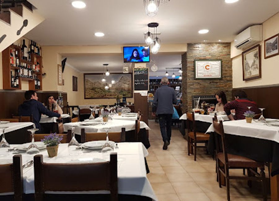 Discover the authentic flavors of Portugal at Casa Capela, a charming restaurant in Gerês offering traditional dishes and local wines.