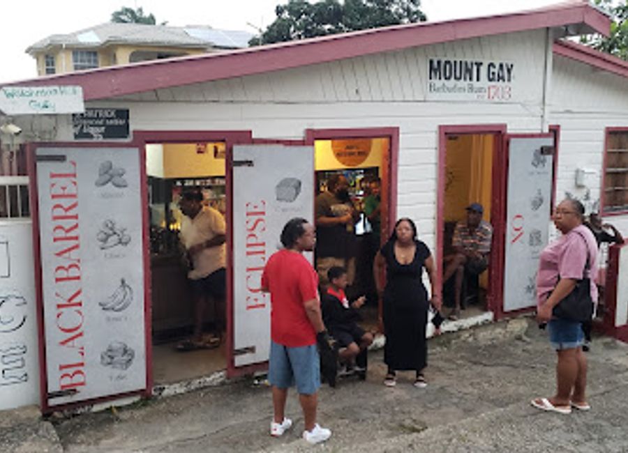 Discover the lively charm of Judy's Watering Hole Rum Shop, where delicious Caribbean cuisine meets vibrant local culture in Chapman, Saint Thomas.