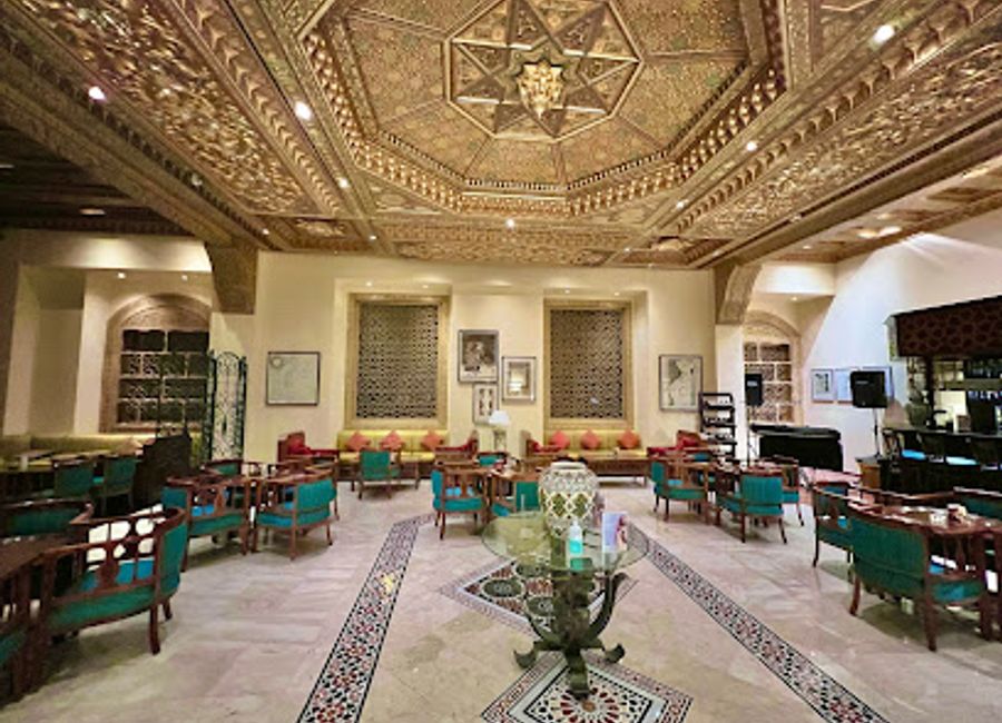 Experience the vibrant atmosphere and authentic flavors of Jordan at Al Maqa'ad Bar in Wadi Musa, the gateway to Petra.