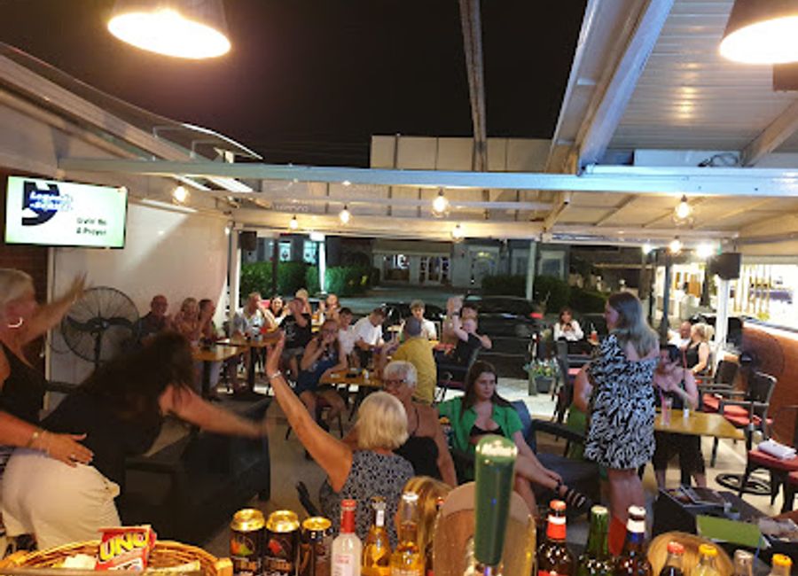 Experience the vibrant nightlife at SpeakEasy Zakynthos, where creative cocktails and a welcoming atmosphere await every traveler.