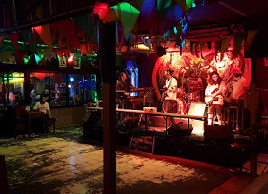 Experience the vibrant fusion of Thai cuisine and reggae beats at Roots Rock Reggae in Chiang Mai, a must-visit for food and music lovers.