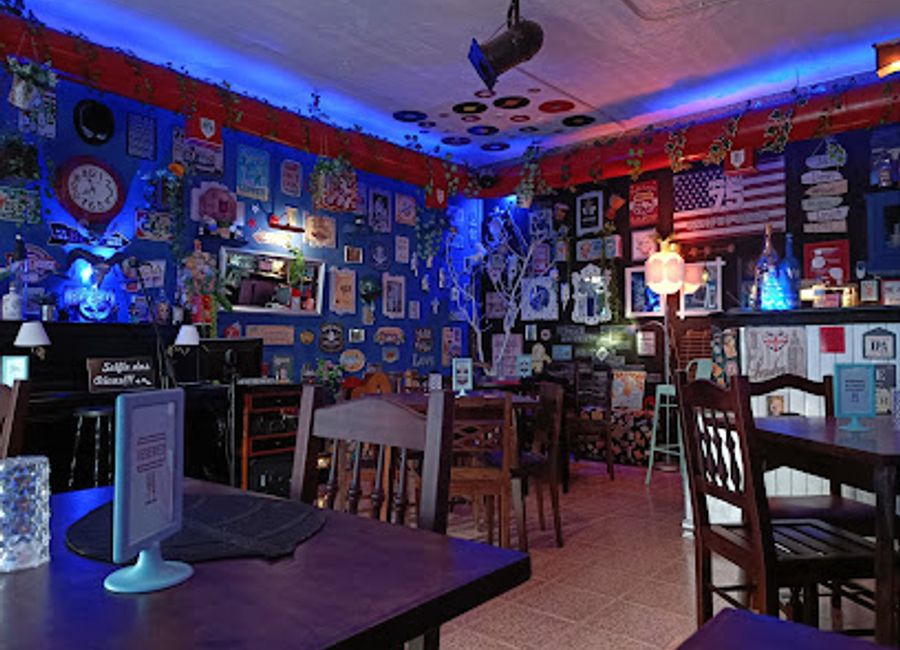 Experience the vibrant nightlife at The Old Bull Bar & Lounge in Sintra, where delightful drinks and a cozy atmosphere await you.