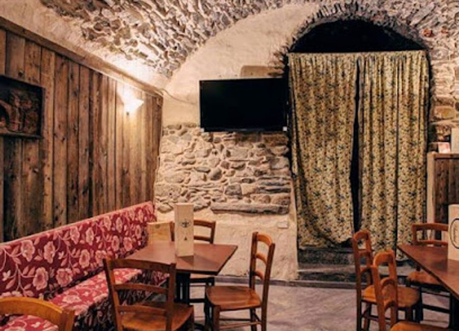 Discover a charming pub in Aosta Valley with local flavors, extensive drinks, and a warm atmosphere perfect for tourists.