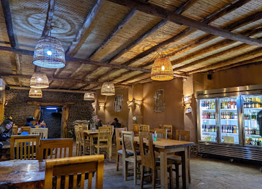 Discover authentic Chilean cuisine at Restaurante Bar Agua Loca in San Pedro de Atacama, where flavor meets culture in a vibrant setting.