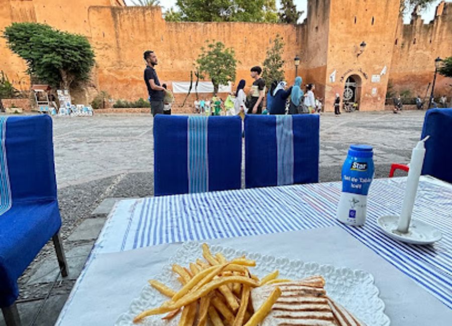 Experience the flavors of Morocco with stunning mountain views at Restaurant Terrasse Djebli in Chefchaouen.