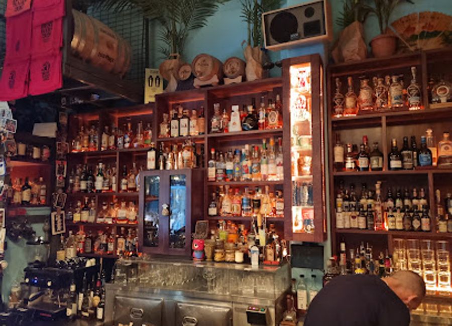 Experience the vibrant nightlife of Athens at Baba au Rum, renowned for its exquisite cocktails and lively atmosphere that promises unforgettable evenings.