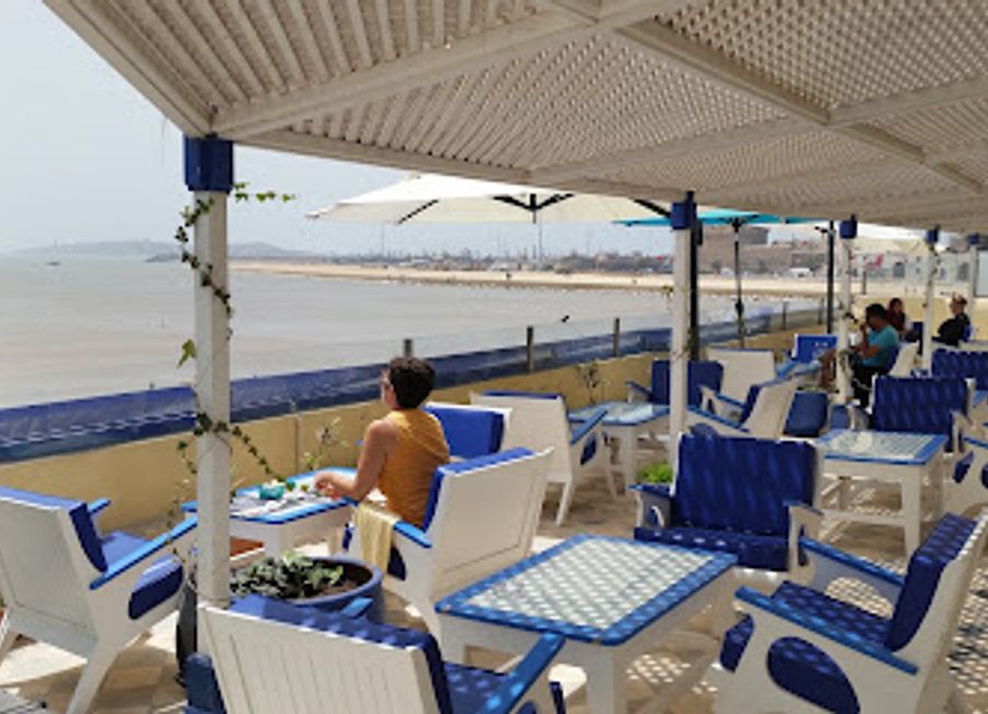 Discover the vibrant culinary scene of Essaouira at Le BAR Celone, where local flavors meet international cuisine in a warm and inviting atmosphere.