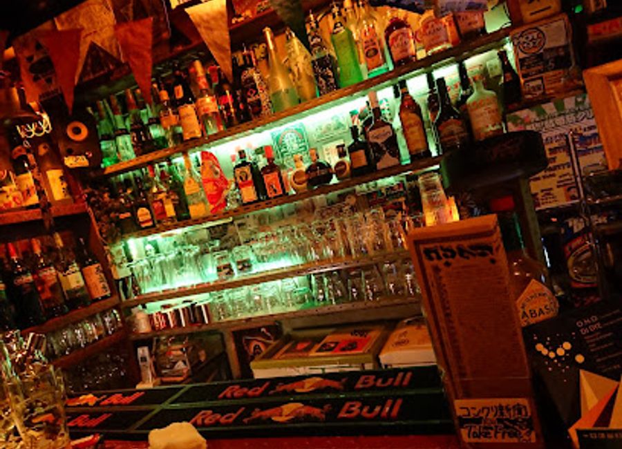 Discover the dynamic nightlife of Kyoto at Concrete Bar, where cocktails flow and friendships blossom in a vibrant atmosphere.