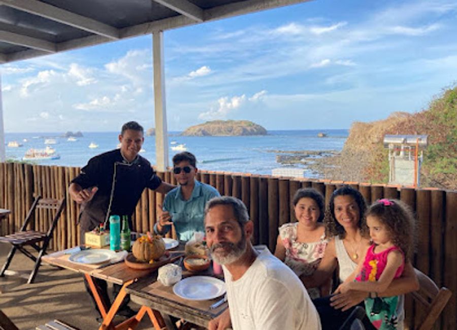 Discover the breathtaking views and vibrant atmosphere of Santo Deck, a charming bar in Fernando de Noronha perfect for relaxation and enjoyment.